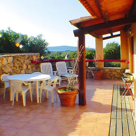 Terraced House In Sardinia Near Surf Paradise Сasa de vacaciones Porto Pollo